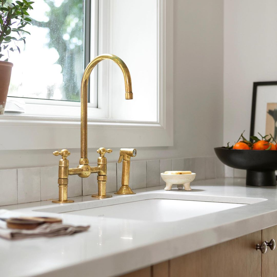 Unlacquered brass kitchen faucets