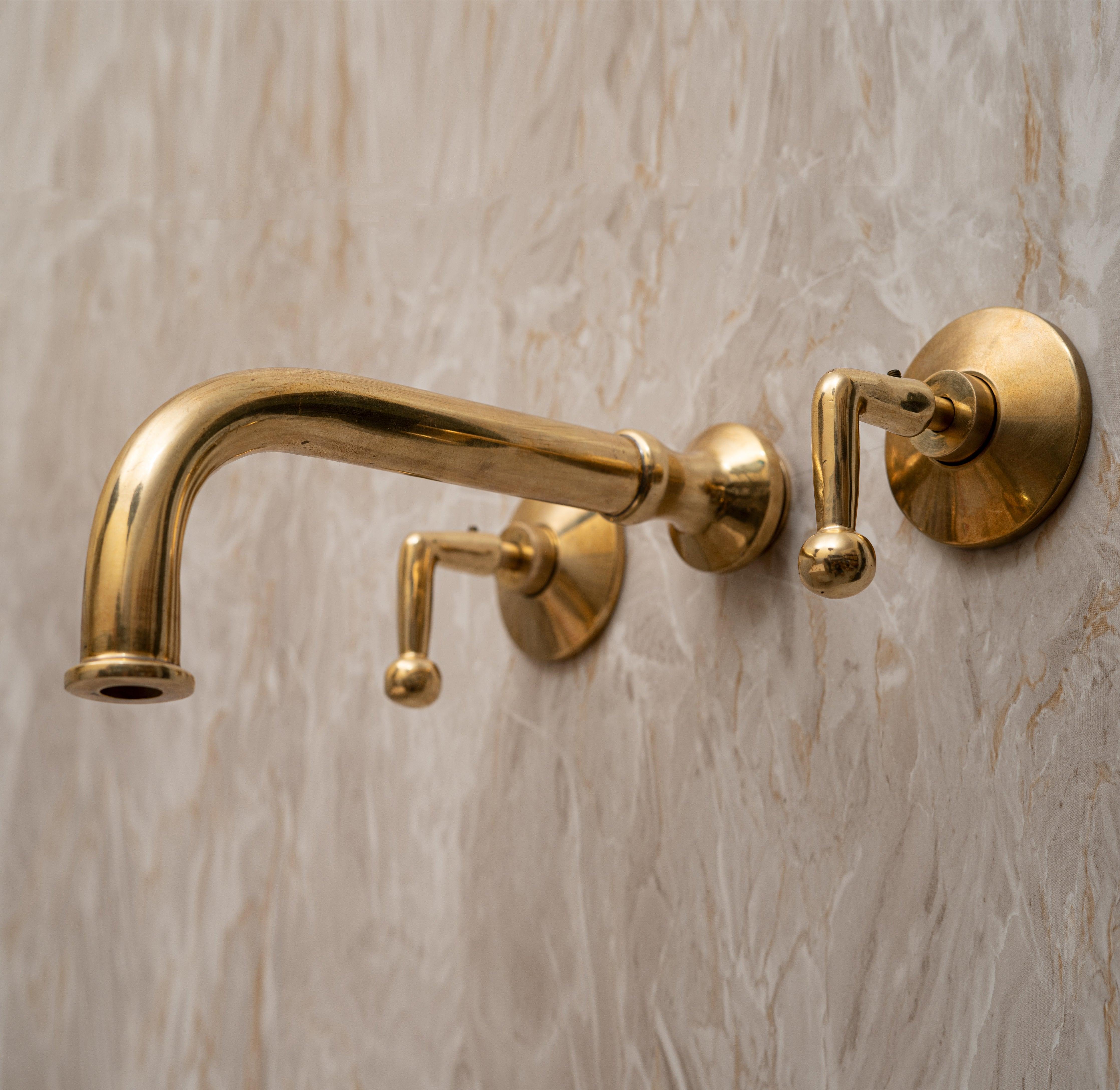 Unlacquered brass faucet bathroom.