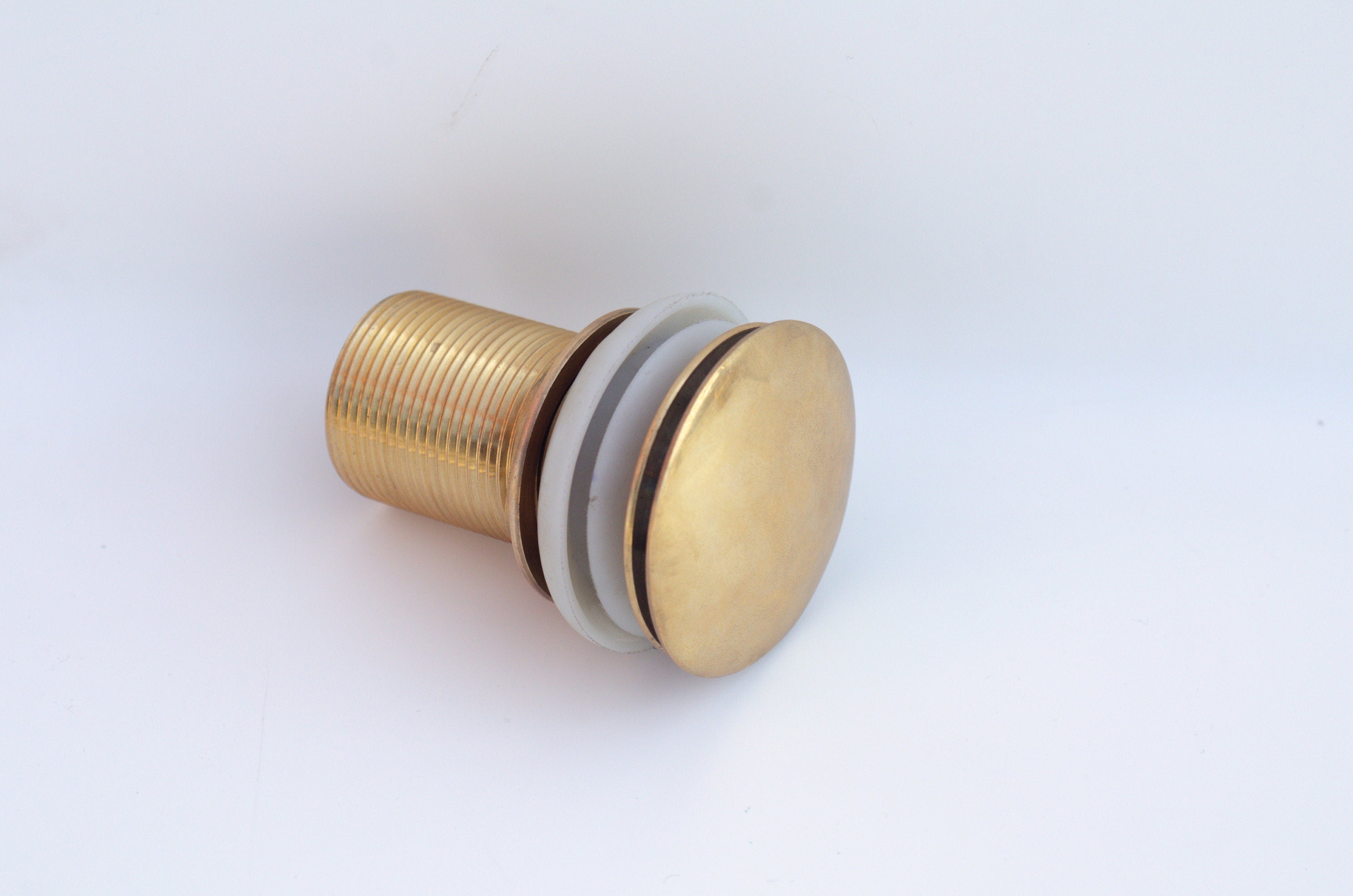 Solid Brass water trap sink stopper with brass push up button Zayian